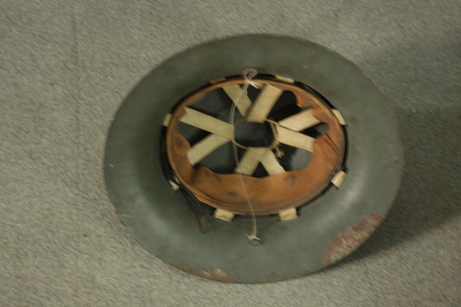 A WWII childs respirator with military issue gas mask and WWII helmet, stamped FG. H47 W.40cm. ( - Image 8 of 9