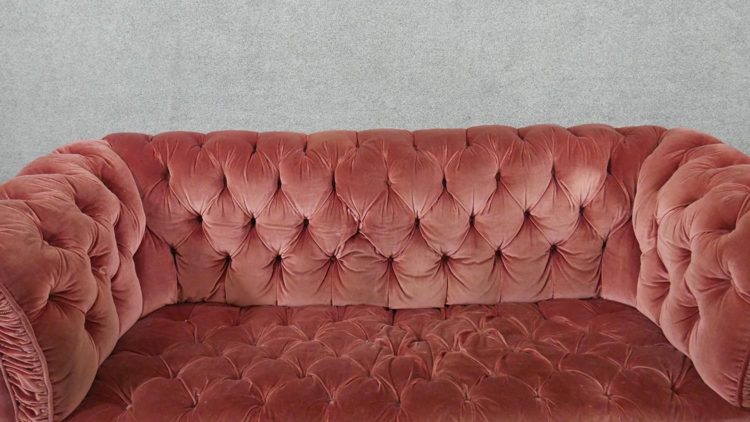 A Victorian Chesterfield sofa, upholstered in pink velour, buttoned to the back, arms, seat and - Image 3 of 6