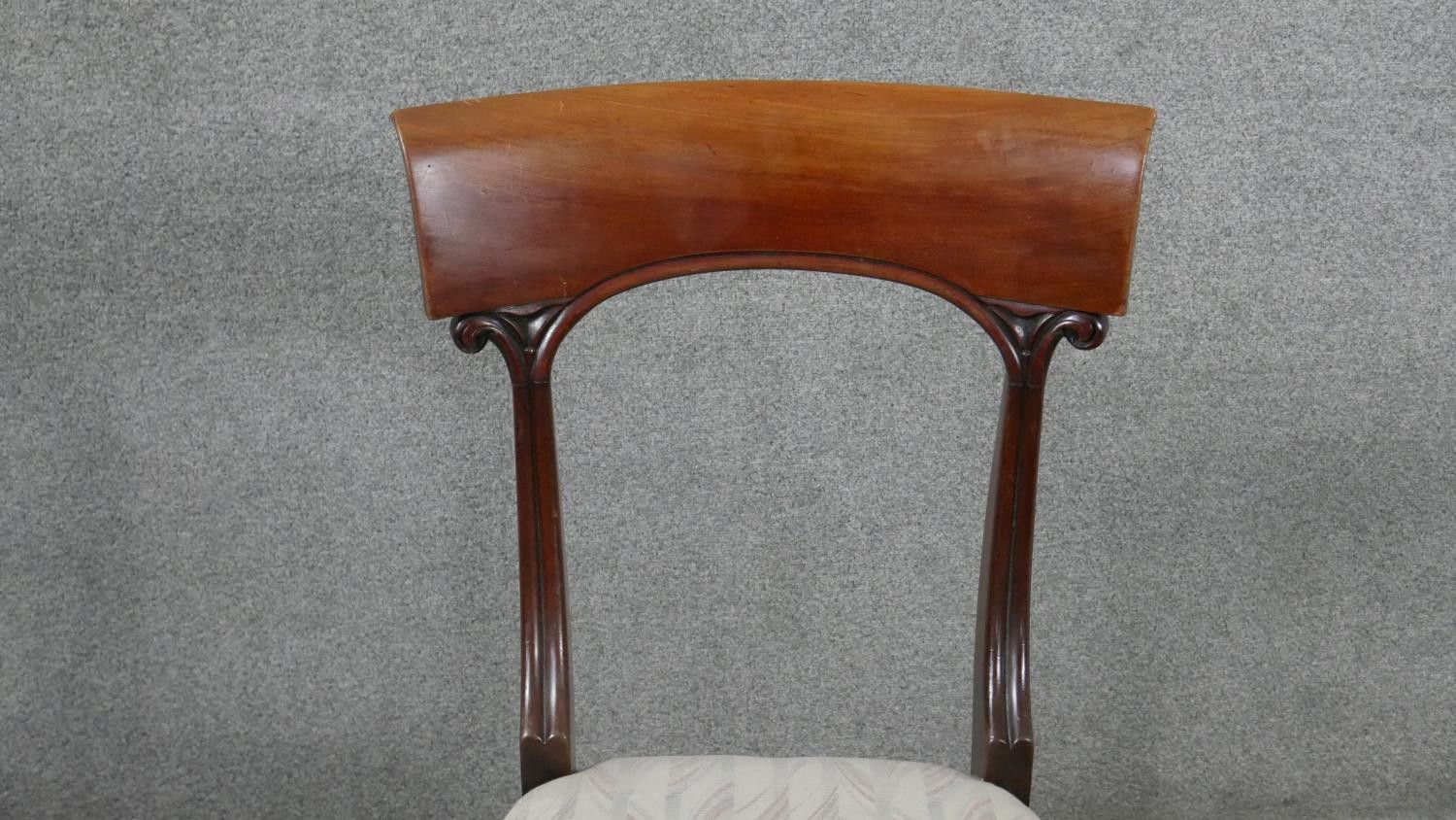 A set of six mahogany dining chairs, circa 1840, with bar backs, on carved reeded supports, over - Image 4 of 7