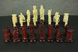 A resin chess set of 'Chinese Immortals' design, with various gods and deities. H.22cm. (largest)