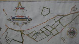 A framed and glazed 17th century hand drawn map showing the land owned by the Manor of Grove, with