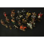 A collection of approximately twenty hand painted die cast metal soldiers, including various knights