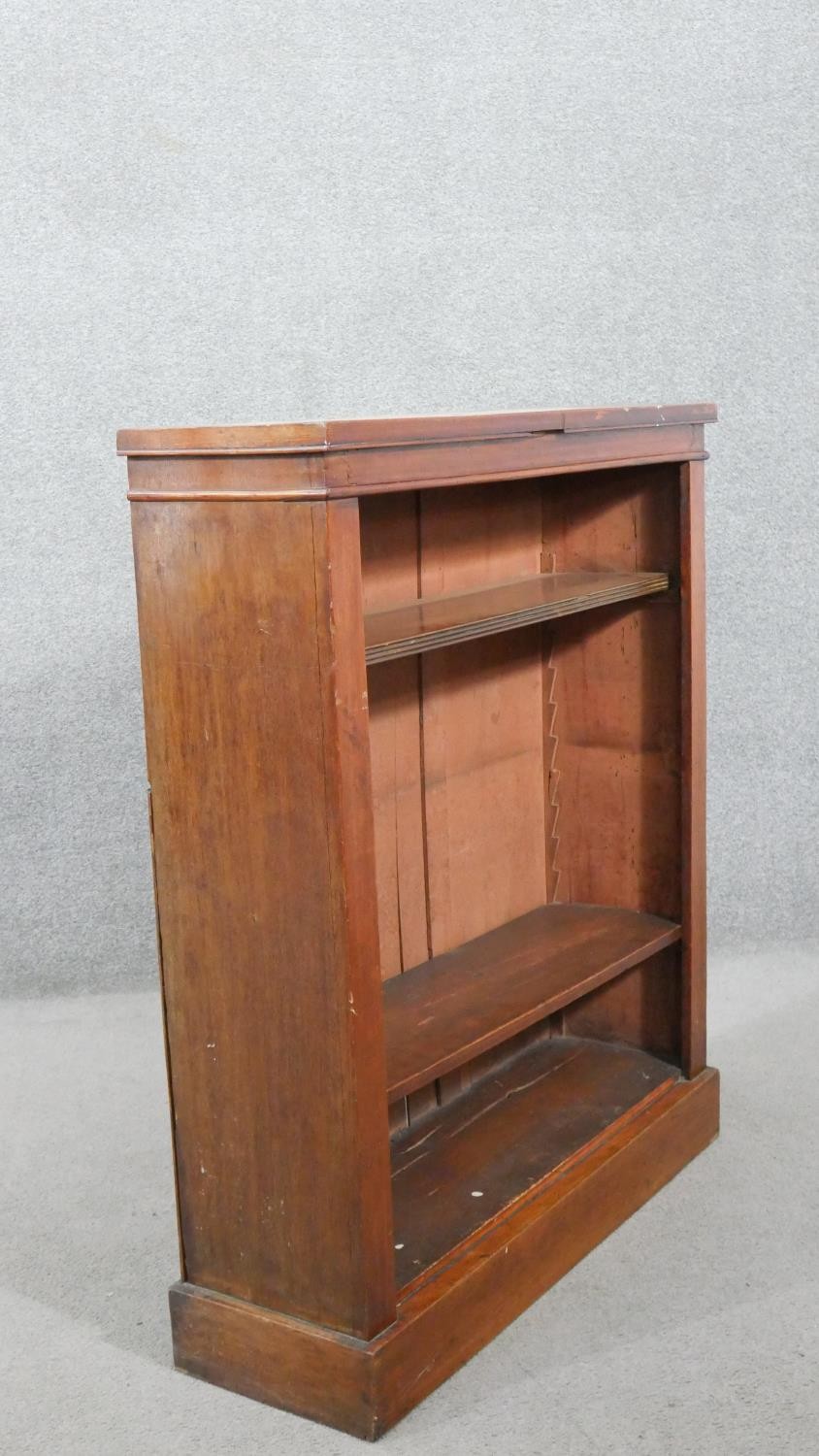A Victorian walnut open bookcase, with adjustable shelving, on a plinth base. H.103 W.86 D.27cm - Image 4 of 4