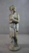 A reconstituted stone figure of a classical female in robes. H.116cm