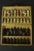 A boxed vintage Anri Charlemagne chess set. Hand-painted composition chessmen on turned wooden