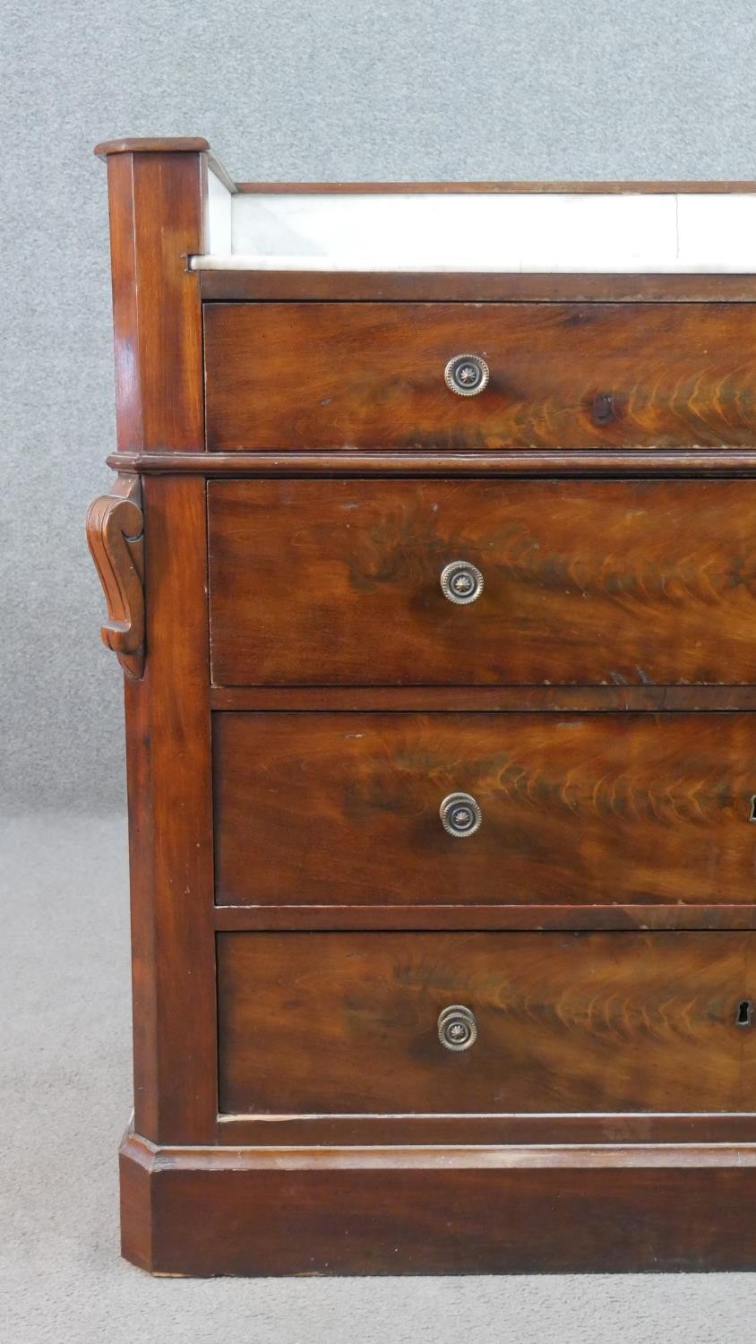 A Victorian flame mahogany dressing chest, with a white marble washstand top, over four long - Image 7 of 9