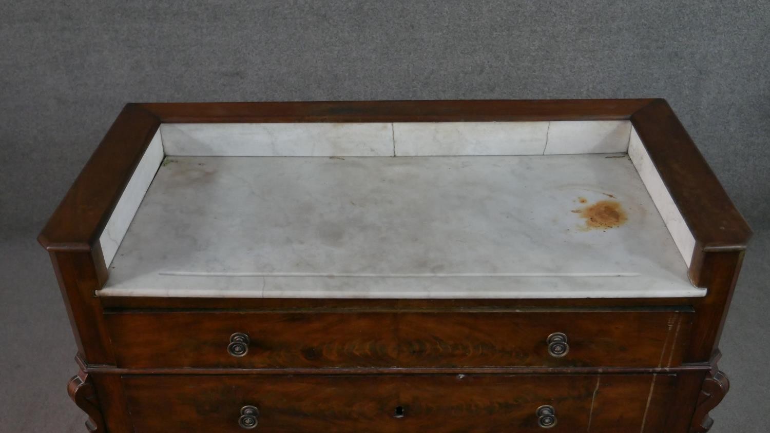 A Victorian flame mahogany dressing chest, with a white marble washstand top, over four long - Image 2 of 9