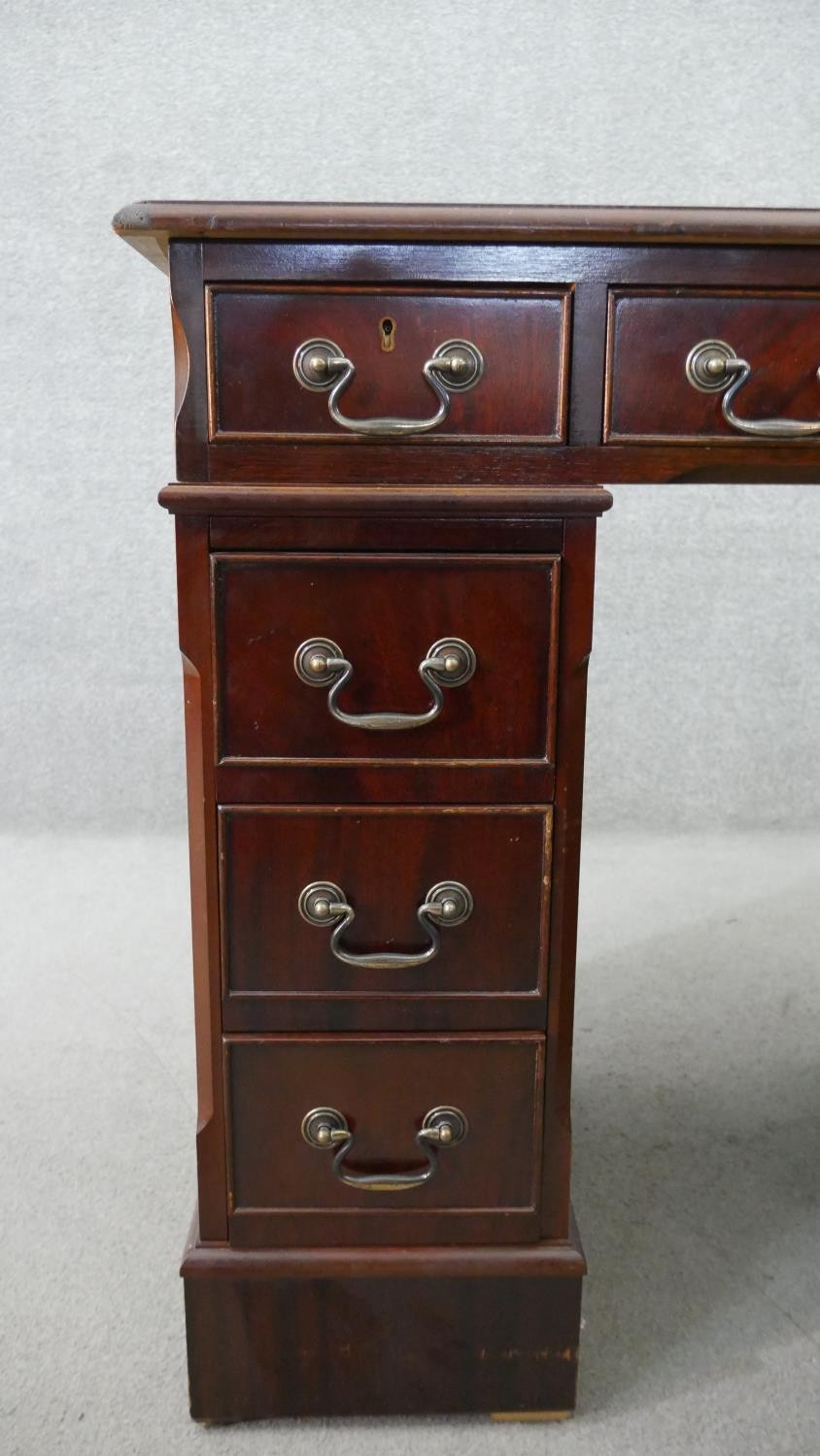 A 19th century style mahogany pedestal desk, of small proportions, with a tooled green leather - Image 3 of 8