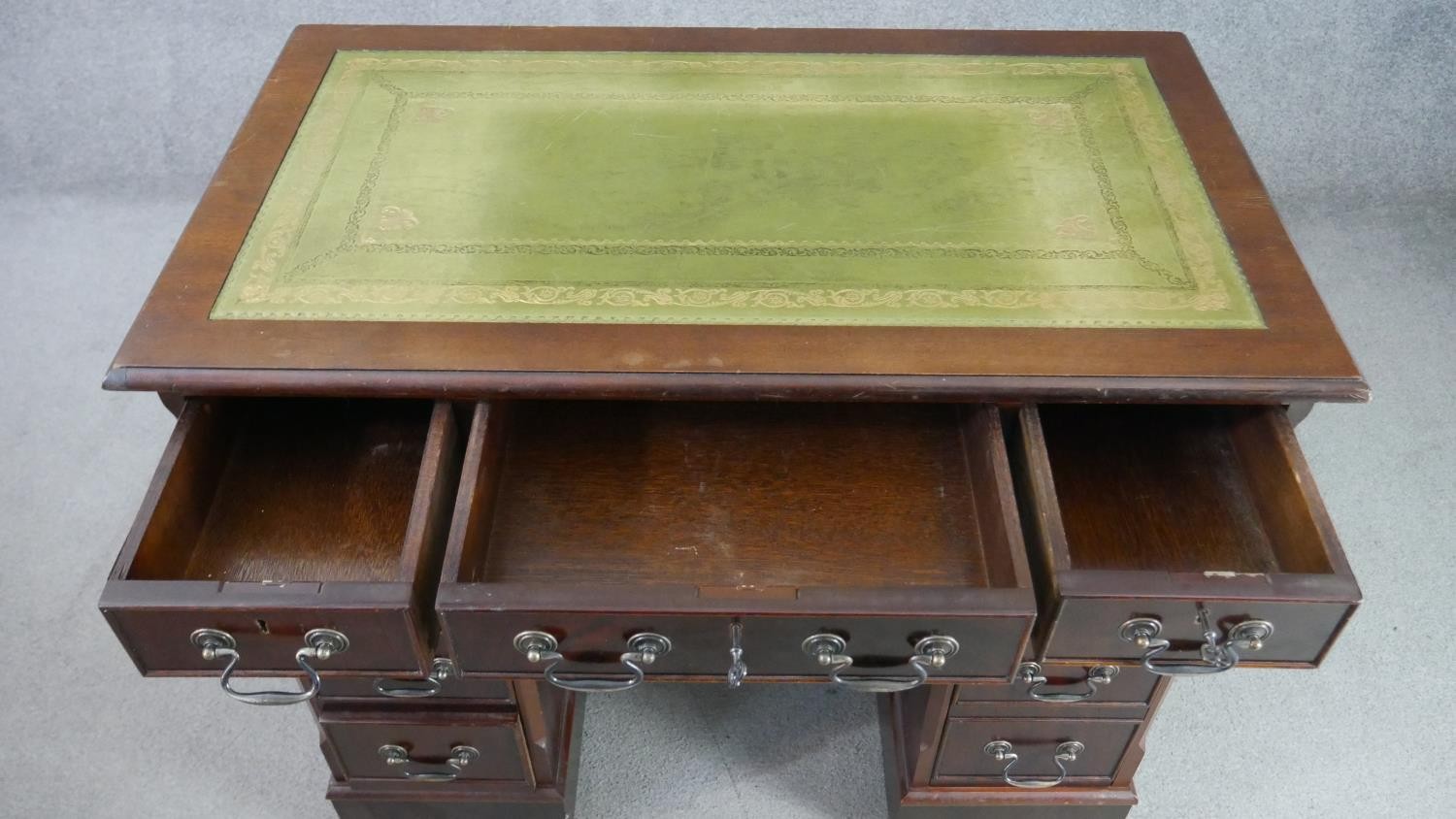 A 19th century style mahogany pedestal desk, of small proportions, with a tooled green leather - Image 8 of 8
