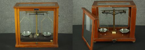 Two sets of Griffin & George Limited scientific scales, with chrome pans, in glazed case with two
