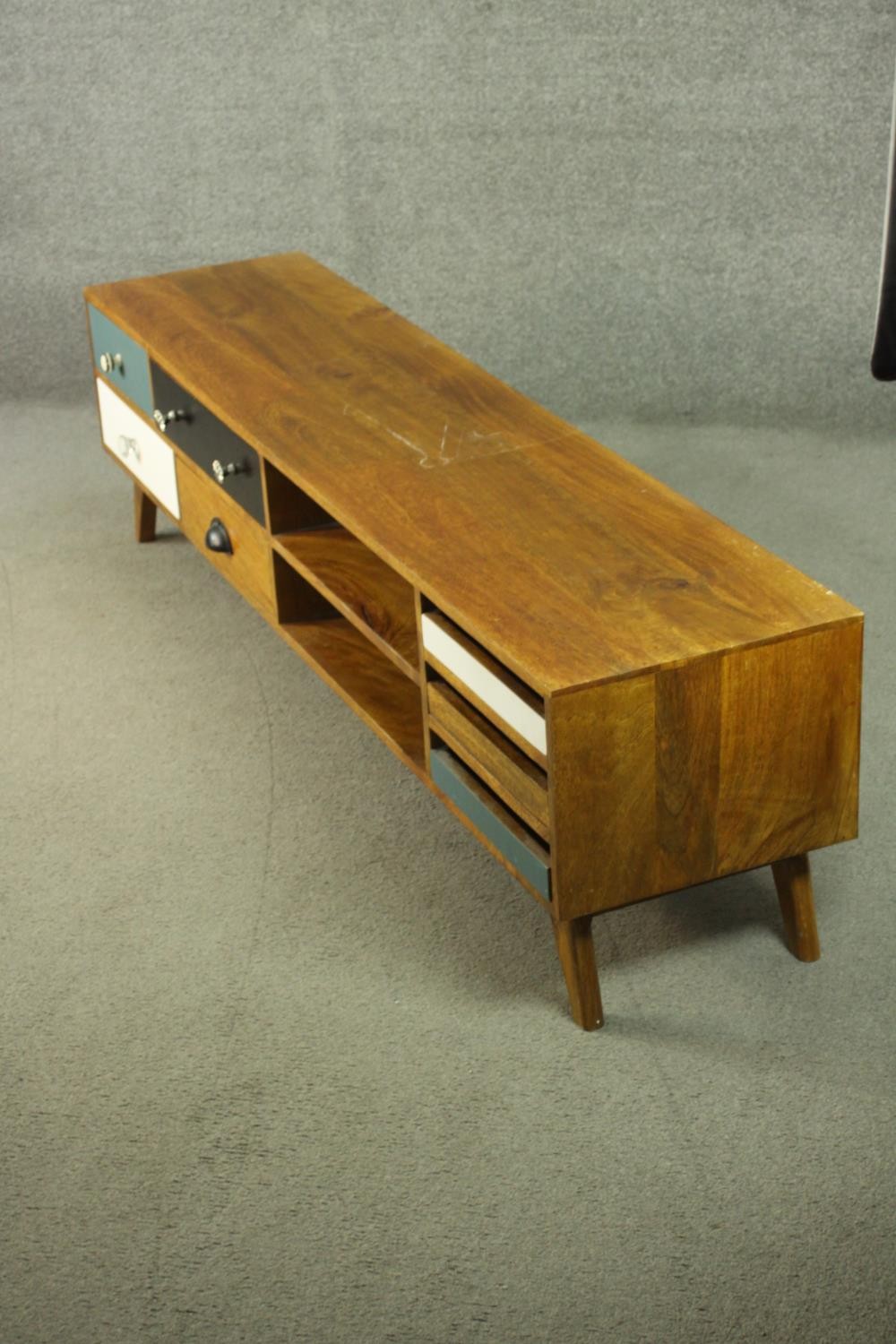 A contemporary mango wood sideboard or media cabinet, with an arrangement of seven drawers, some - Image 6 of 12