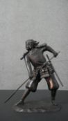 A cast copper statue of a Japanese Samurai. H.31cm