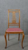 A circa 1900 Continental satinwood side chair, with a pierced splat back, the seat upholstered in