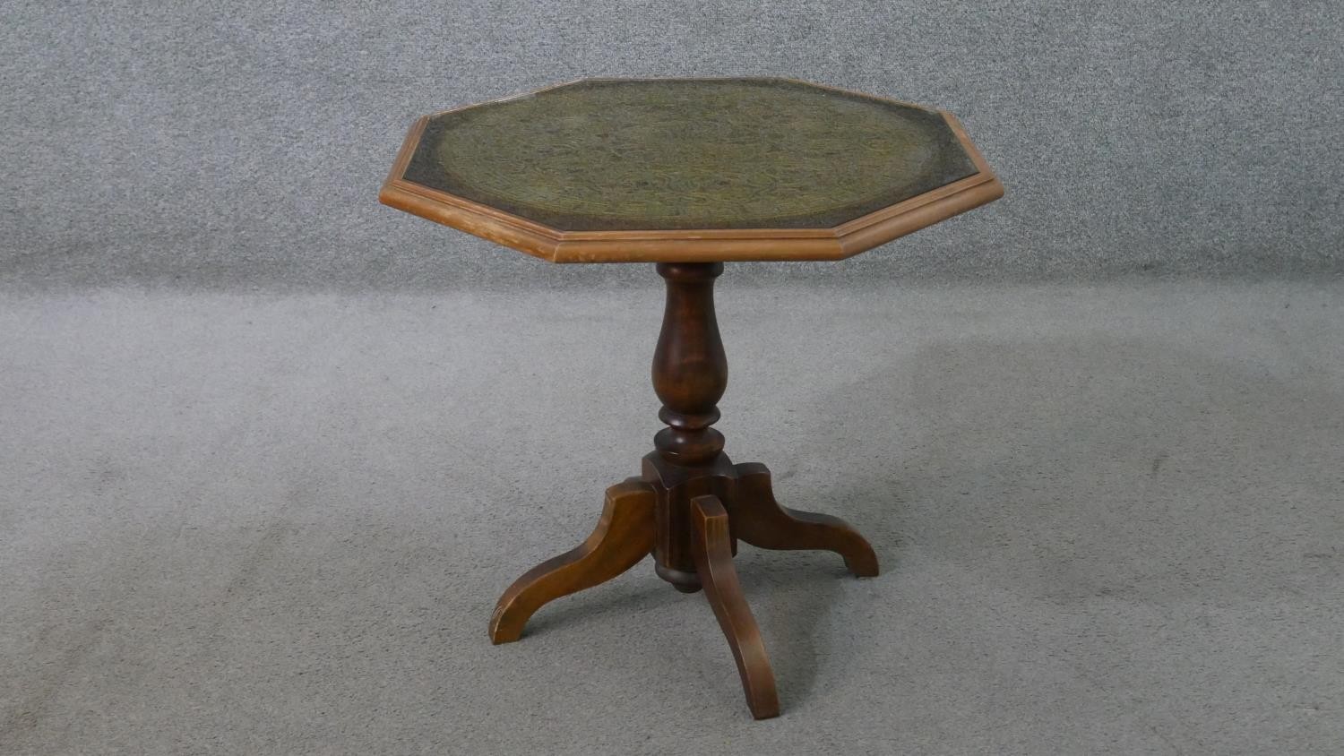 A 20th century octagonal occasional table, with a carved top, on a turned baluster stem, with four - Image 2 of 6