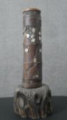A large Oriental carved bamboo brush pot with figural design and mother of pearl flower detailing.