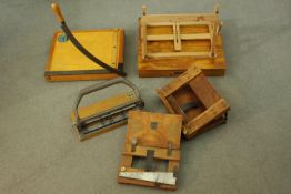 A collection of vintage drawing and art implements. A Jaycee guillotine, a punch, a travelling