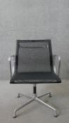 Charles and Ray Eames for Vitra, a Model EA107 or EA108 desk chair with black mesh back and seat,