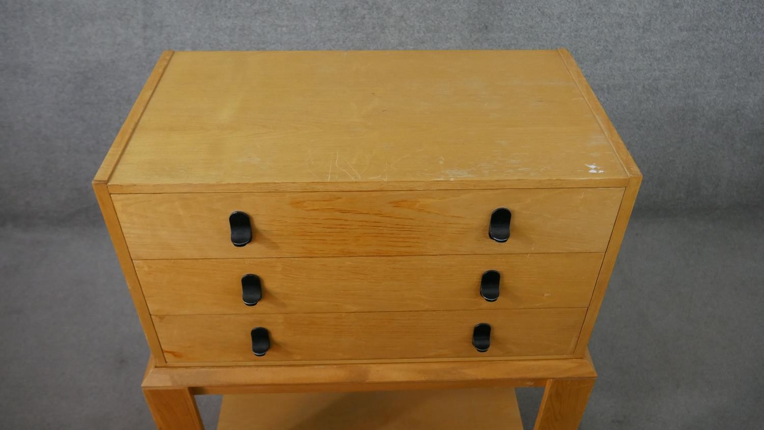 A 20th century ash chest on stand, with three long drawers over bracket legs, joined by an - Image 2 of 5