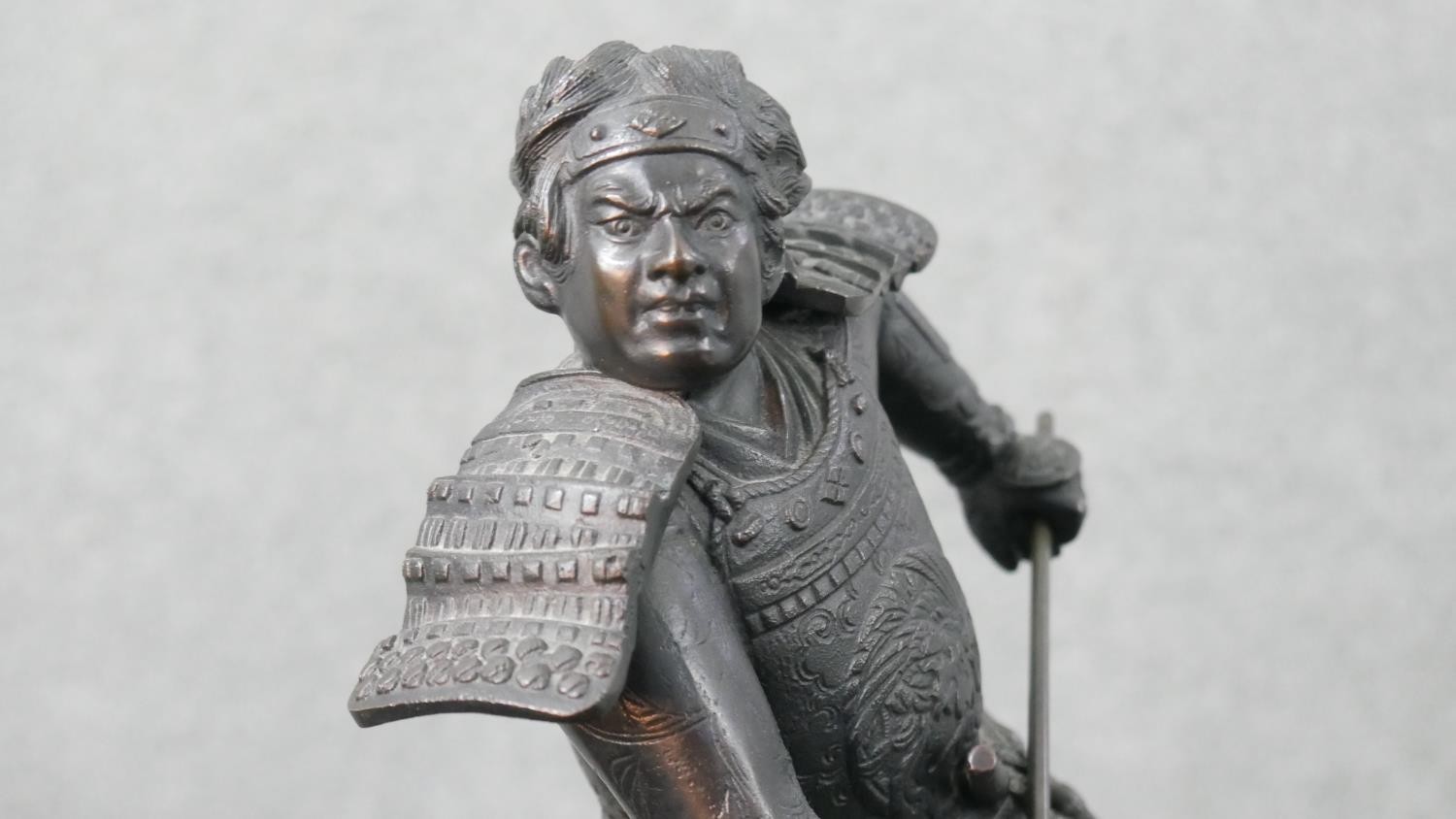 A cast copper statue of a Japanese Samurai. H.31cm - Image 6 of 9