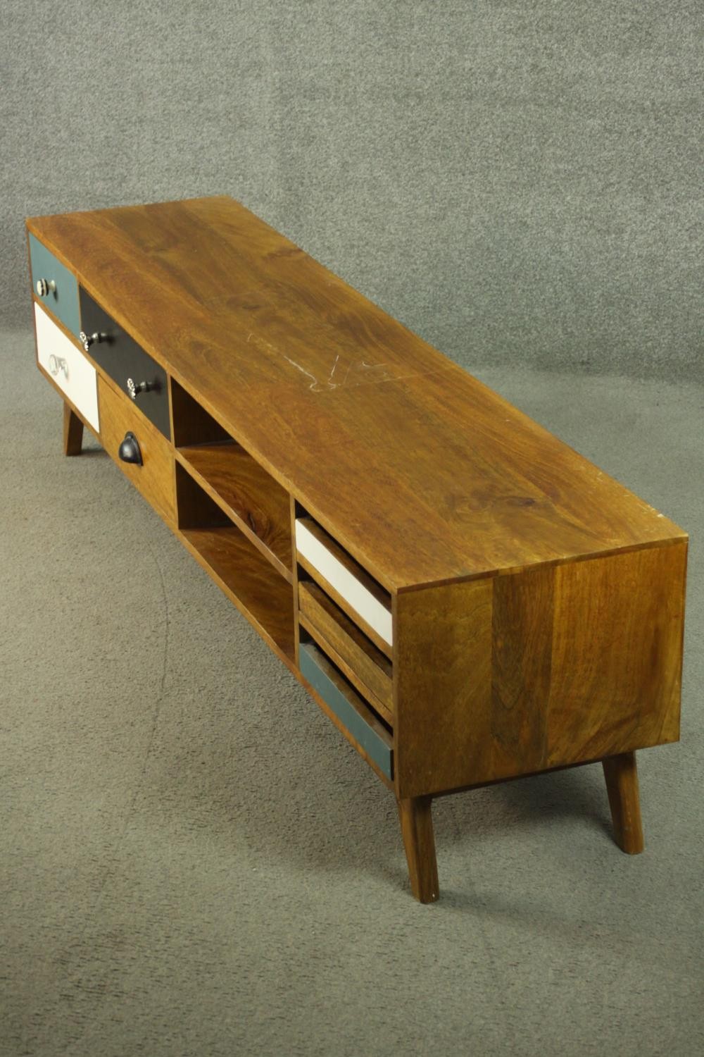 A contemporary mango wood sideboard or media cabinet, with an arrangement of seven drawers, some - Image 7 of 12