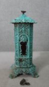 A late 19th century French turquoise enamelled floorstanding cast iron stove, decorated allover with