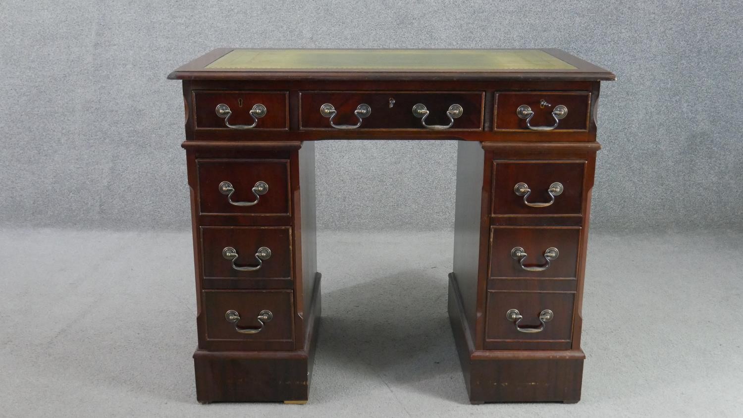 A 19th century style mahogany pedestal desk, of small proportions, with a tooled green leather - Image 4 of 8