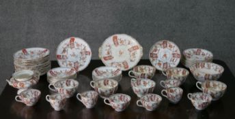 A twelve part early 20th century hand painted tea set, decorated with prunus blossom and a