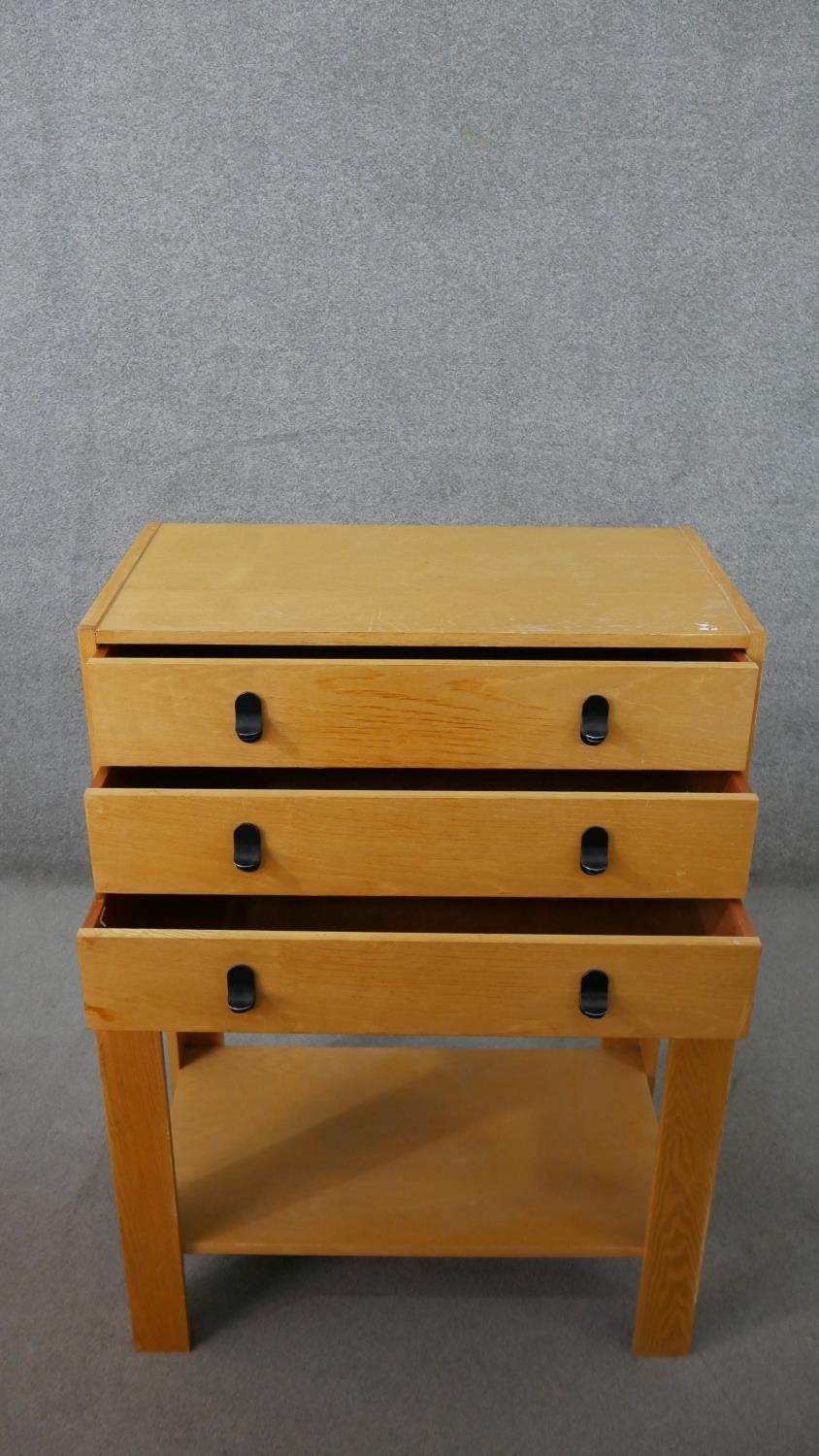 A 20th century ash chest on stand, with three long drawers over bracket legs, joined by an - Image 3 of 5