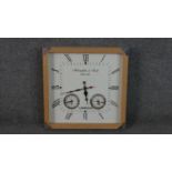 A reproduction square McLaughlin & Scott wall clock with pine frame. H.40 W.40cm