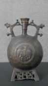 A Balkan 15th century style flask with St George motif to the middle and animal design to the