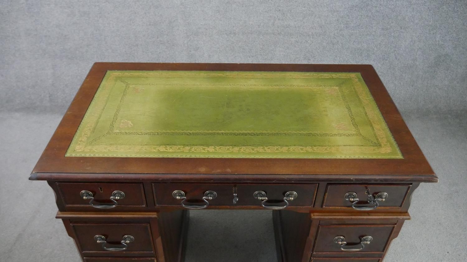 A 19th century style mahogany pedestal desk, of small proportions, with a tooled green leather - Image 5 of 8