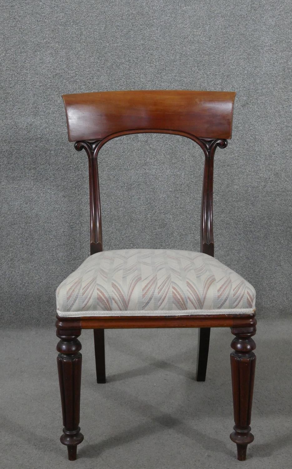 A set of six mahogany dining chairs, circa 1840, with bar backs, on carved reeded supports, over - Image 2 of 7