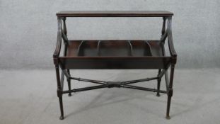A George III style mahogany book trough stand, with a rectangular shelf over turned supports,