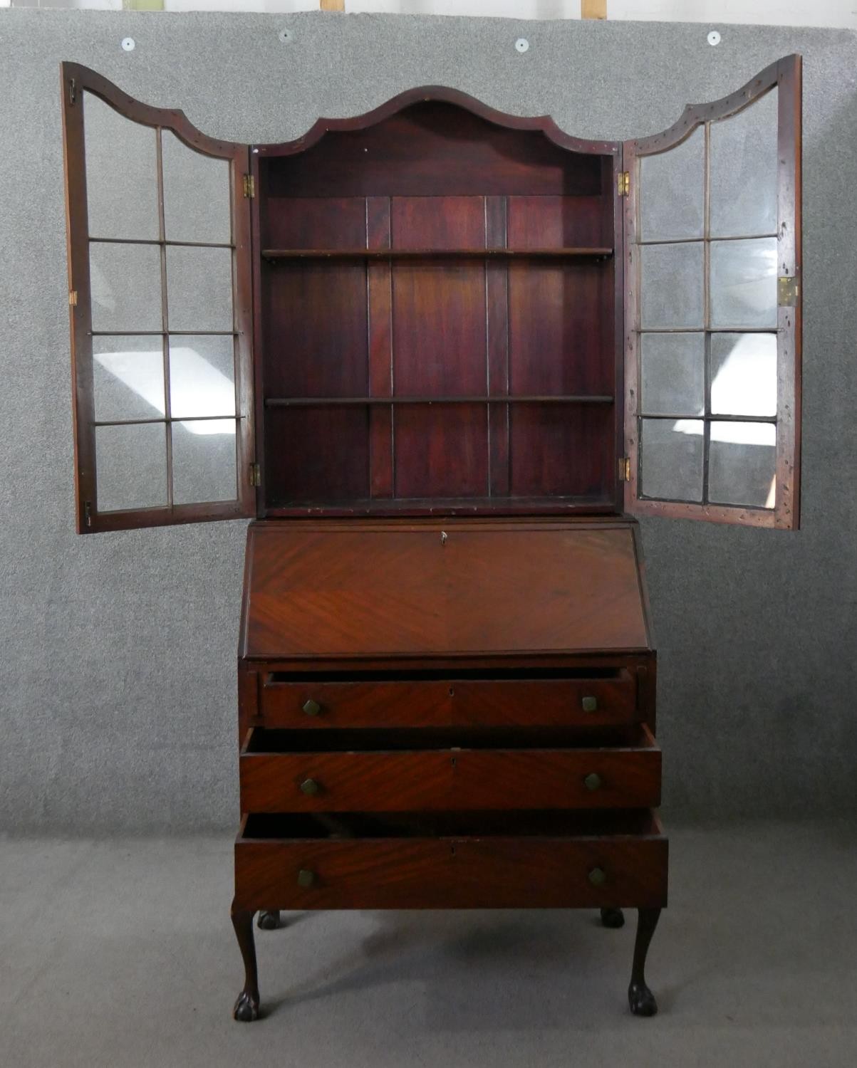 An Edwardian mahogany bureau bookcase, with two glazed doors enclosing shelves, over a quarter - Image 2 of 8