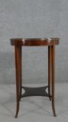 An Edwardian mahogany and satinwood strung circular occasional table, on square section splayed legs