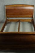 A French cherrywood king size sleigh bed frame. L.220 W.158. Mattress size. 190 x 150cm.