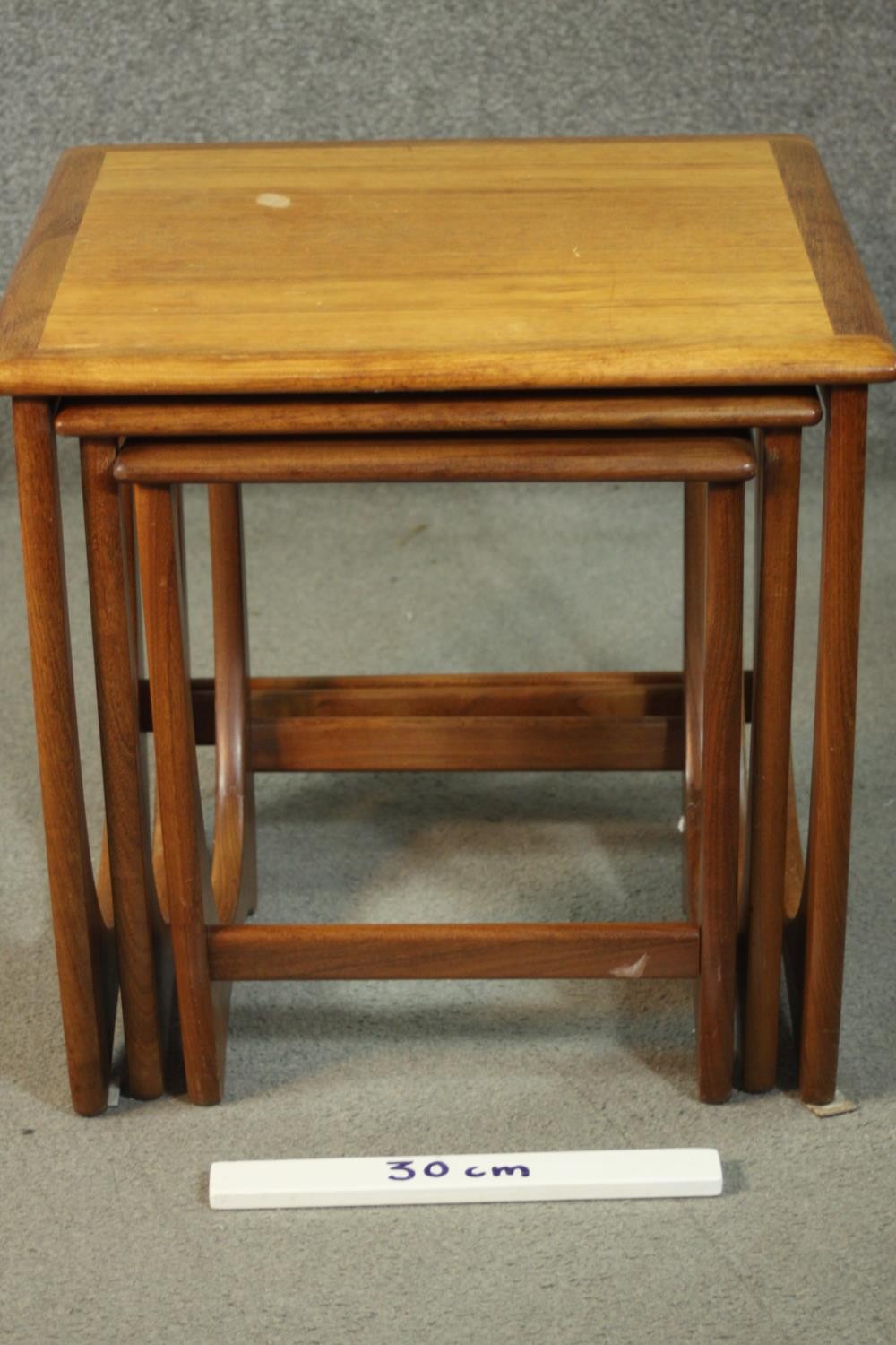 A circa 1970s nest of three teak G-Plan style tables, with crossbanded tops. H.51 W.50 D.49cm. - Image 2 of 9