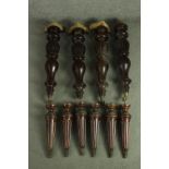 Two sets of furniture legs, including a set of four early Victorian mahogany turned and carved legs,