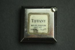 A Tiffany & Co retired solid parfum compact. L.4 W.4cm.