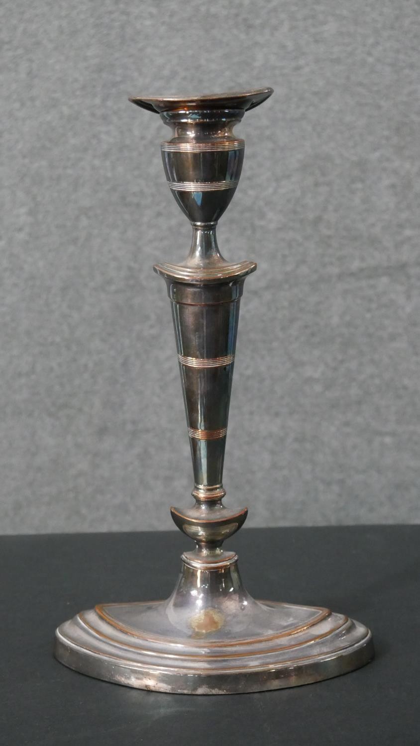 A pair of early 20th century silver plated candlesticks with weighted bottoms. H.29 W.17cm - Image 2 of 5