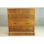 A late Victorian walnut chest of two short over three long drawers, on a plinth base. H.113 W.110