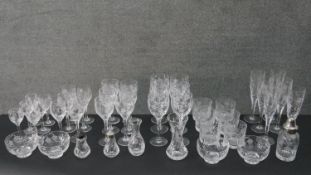 A large collection of Stuart 'Cascade Fuchsia' design crystal for six people, including wine