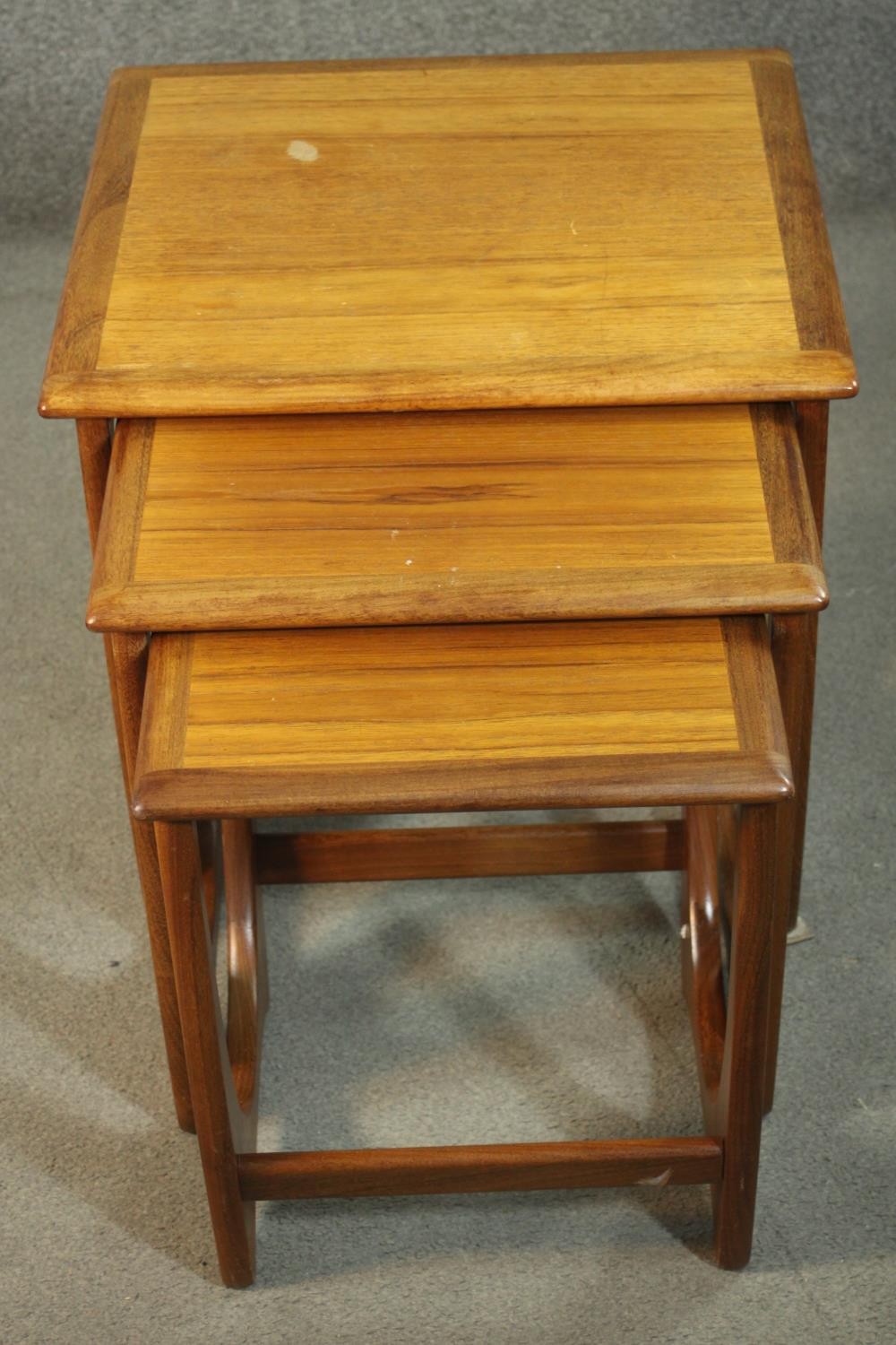 A circa 1970s nest of three teak G-Plan style tables, with crossbanded tops. H.51 W.50 D.49cm. - Image 3 of 9