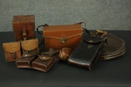 A collection of seven tan and brown leather vintage bags and cases. H.23 W.13 D.13cm. (largest)