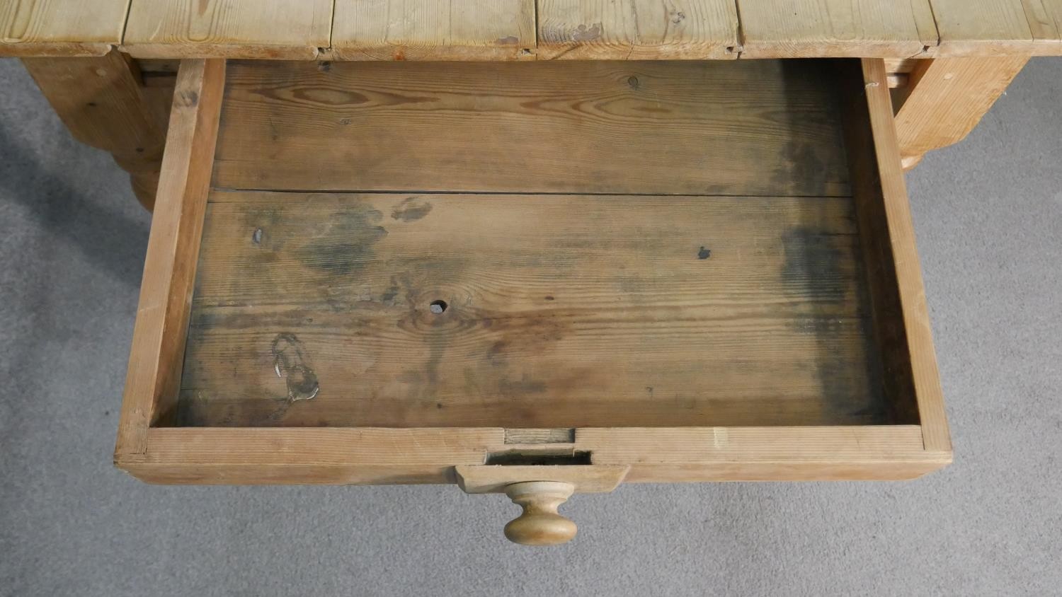 A Victorian pine planked top kitchen table, with an end drawer, on turned legs. H.75 W.186 D.97cm - Image 3 of 6