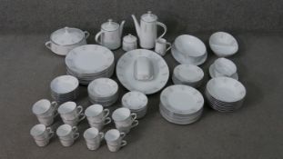 A Noritake porcelain 'Isabella' pattern tea, dinner and coffee service, for eight people. Maker's