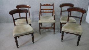 A set of four Victorian mahogany bar back dining chairs, upholstered in beige velour, together