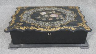 A 19th century papier-mâché writing slope with inlaid abalone shell in a floral design. H.9 W.31 D.