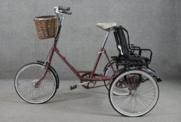 A vintage Pashley Picador Plus adult`s tricycle with twin child's seat.