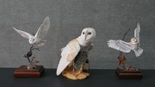 A Franklin Mint porcelain hand painted Barn Owl along with two other hand painted ceramic flying